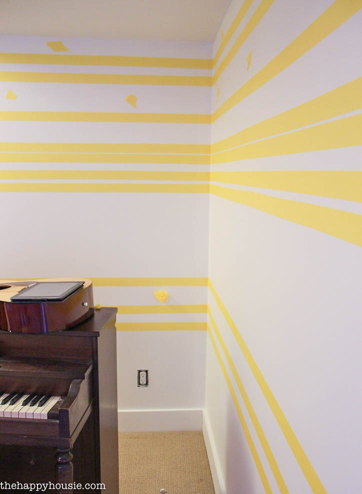 The bold yellow stripes of the feature wall.