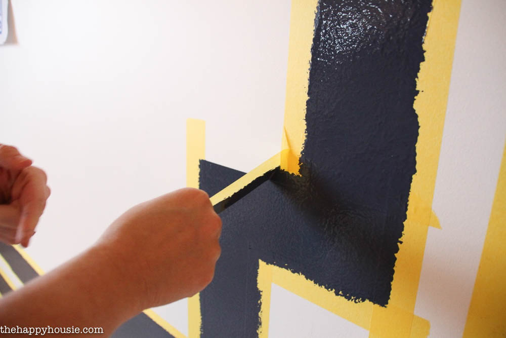 FrogTape Room Makeover Post 4 Reveal with painted greek key design and painted irregular striped pattern-5