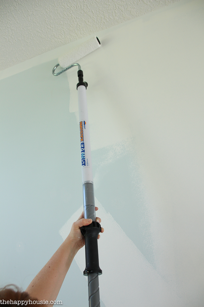 Painting the living room with Benjamin Moore Simply White in no time flat with a HomeRight EZ Twist Paint Stick -21