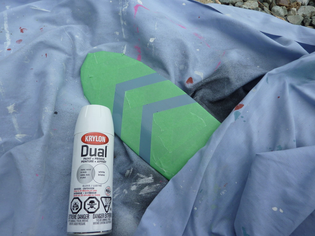 The oar outside being spray painted.