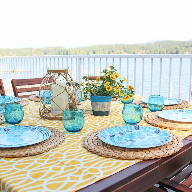 Lake House Summer Tour with beachy coastal colourful entry hall dining room and deck at the happy housie-66