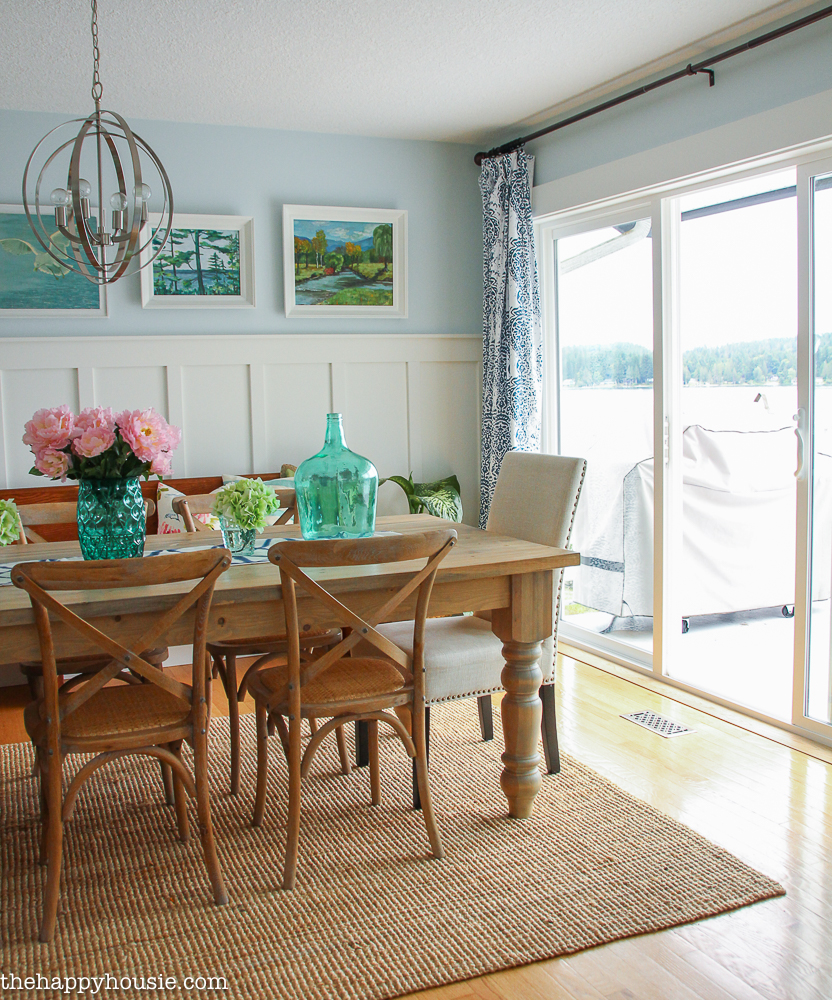 Lake House Summer Tour with beachy coastal colourful entry hall dining room and deck at the happy housie-11