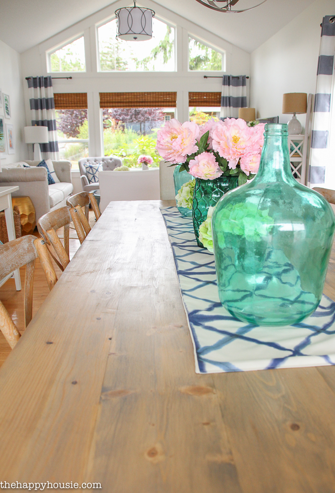 Lake House Summer Tour with beachy coastal colourful entry hall dining room and deck at the happy housie-12
