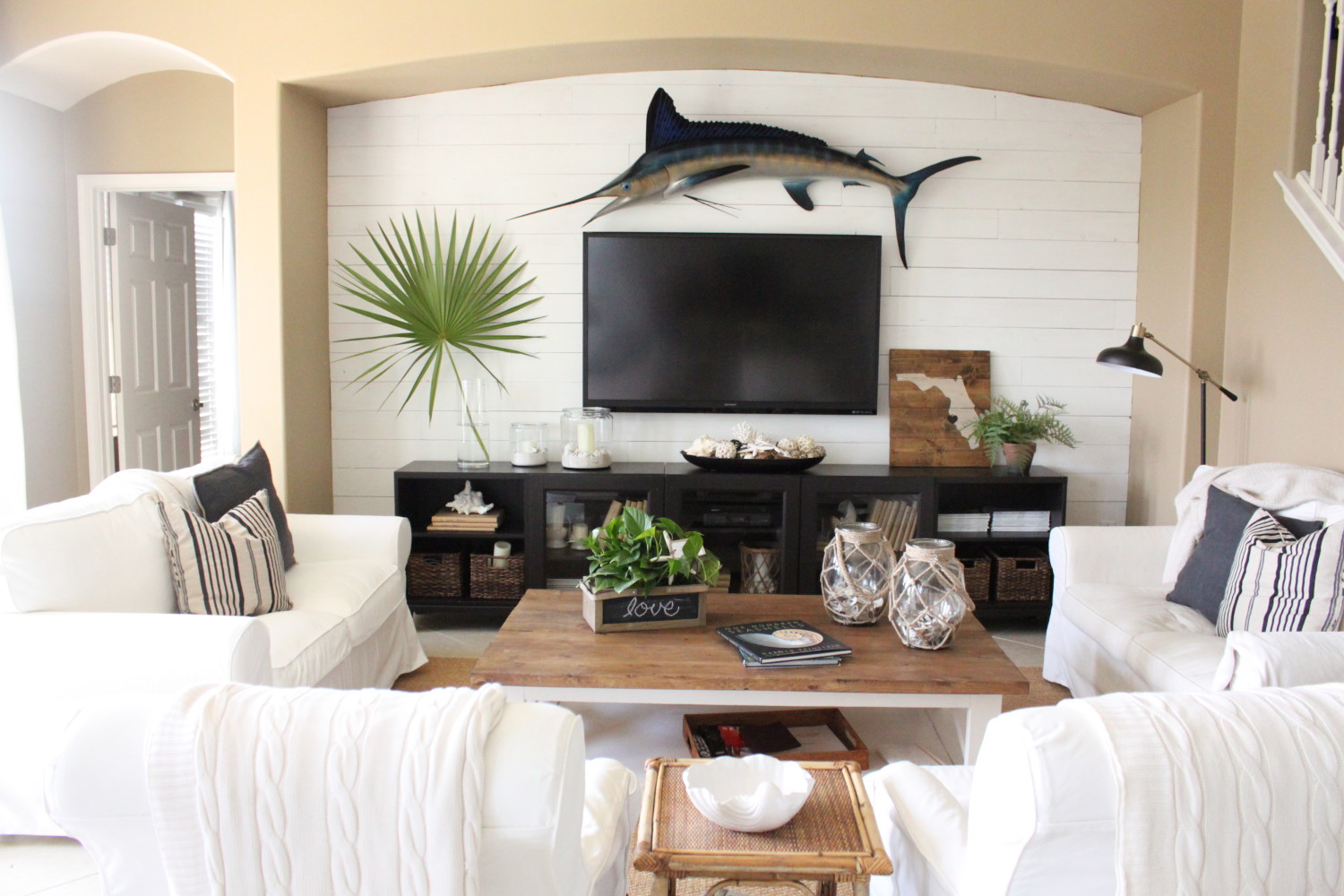 Ways to Go Coastal shiplap accent wall at Starfish Cottage