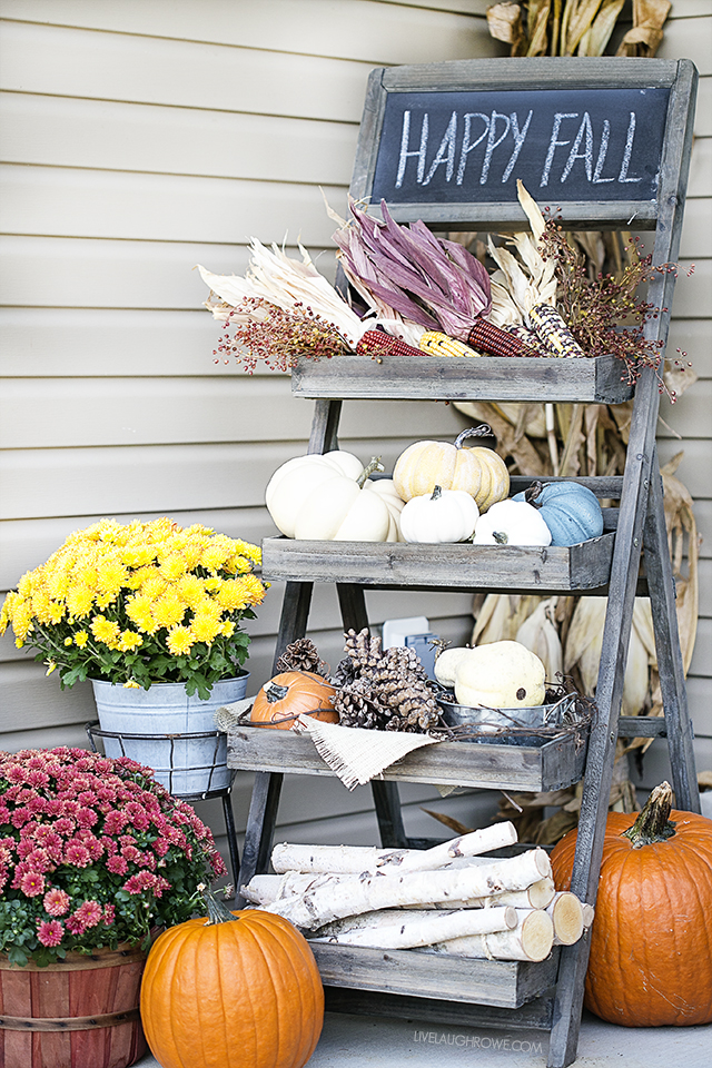Fall Front Porch Decor to inspire you! Colorful Pumpkins, Corn Husks and a lovely sitting area. livelaughrowe.com 