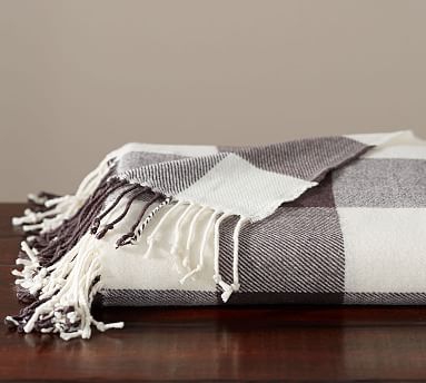 You'll love this stunning buffalo check plaid throw from Pottery Barn it's the perfect way to add some warmth to your decor this fall and winter affiliate link