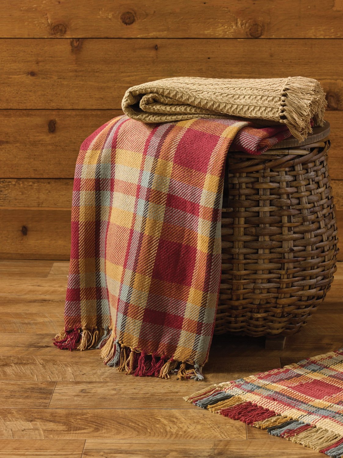 You'll love this stunning warm toned plaid throw from Amazon it's the perfect way to add some warmth to your decor this fall and winter affiliate link