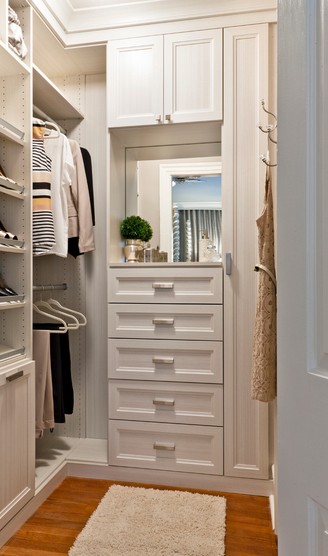 nice-small-walk-in-closet-white-chocolate-textured-melamine-recessed-panel-doors-and-drawer-fronts-crown-and-base-moldings