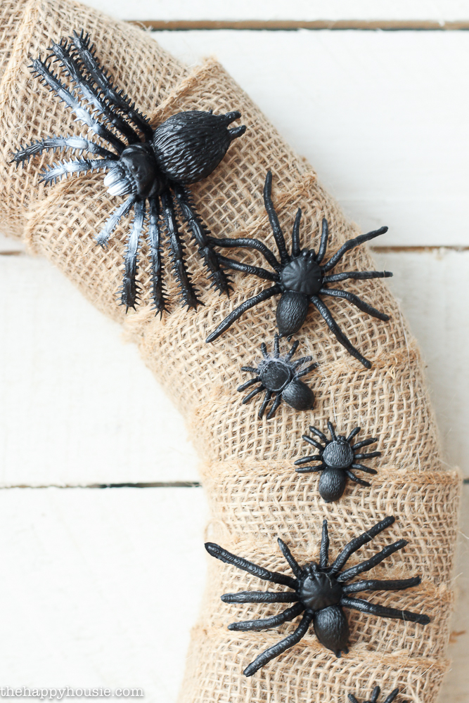 The black spiders on the burlap wreath.