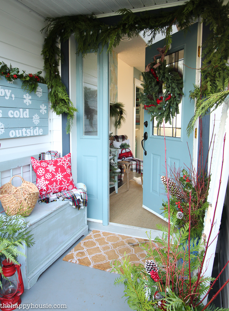classic-red-plaid-christmas-front-porch-and-entry-hall-35