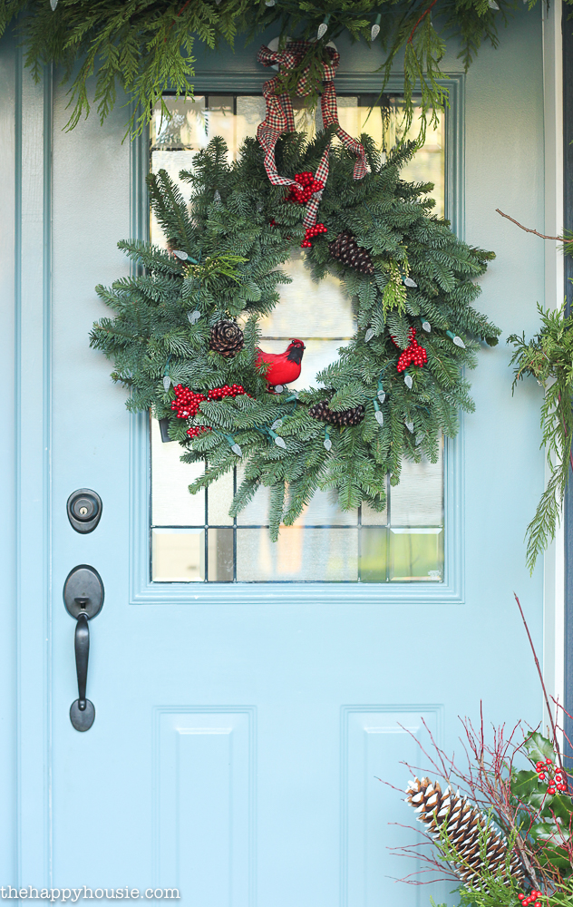 classic-red-plaid-christmas-front-porch-and-entry-hall-48