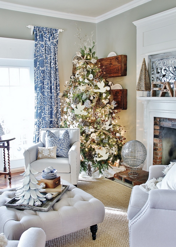 A white living room with pops of blue.