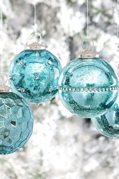 Blue Christmas ornaments with rhinestones.