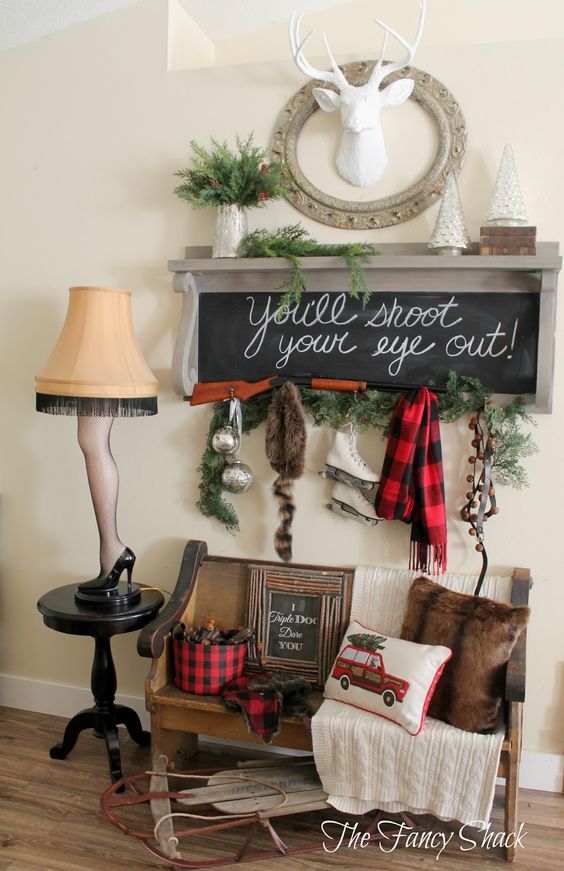 There is a little wooden bench with a faux fur pillow and a skeet shooter gun vignette.