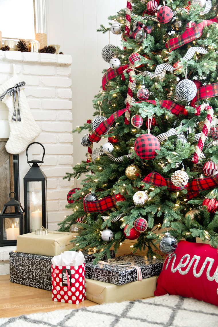 A classic tree decorated with red buffalo checked pattern.