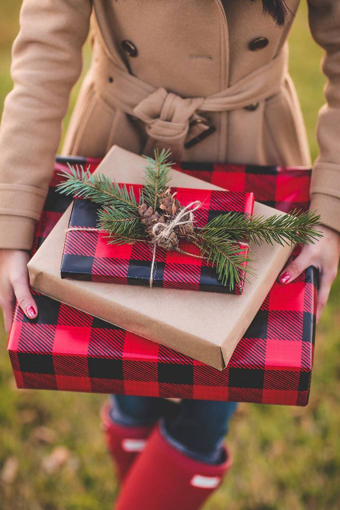 Christmas wrapping paper in red and black buffalo checked print.