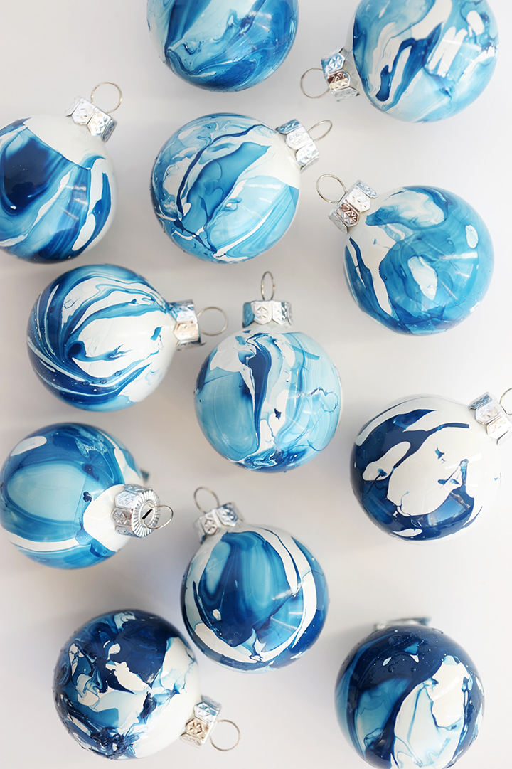 Blue Christmas ornaments on the table.