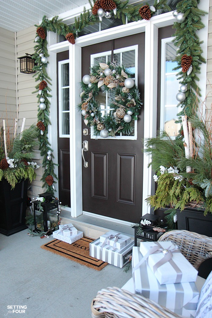 There is a wreath on the front door.