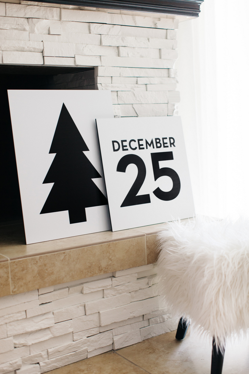Graphic Christmas signs in black and white.