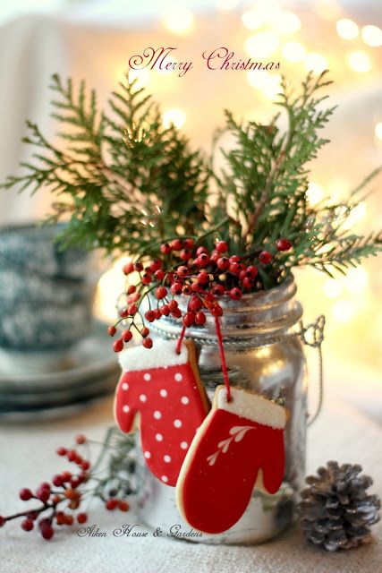 A mason jar decorated for the holidays.