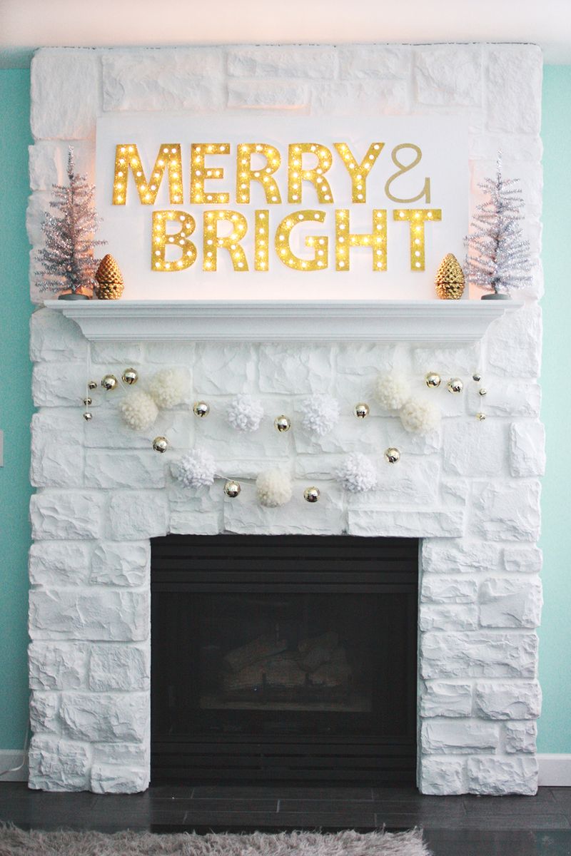 A marquee Merry & Bright sign above the fireplace.