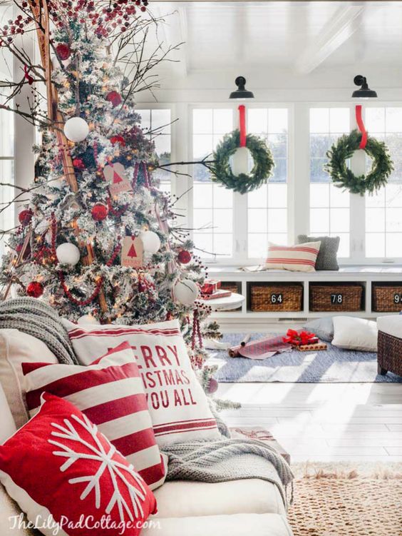 A sunroom decorated for Christmas.