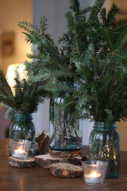 winter-decor-blue-mason-jars-and-greenery