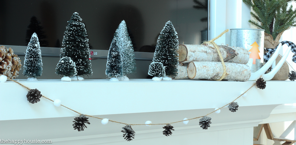 simple-rustic-natural-winter-mantel-decor-with-bottle-brush-trees-at-the-happy-housie-10-2