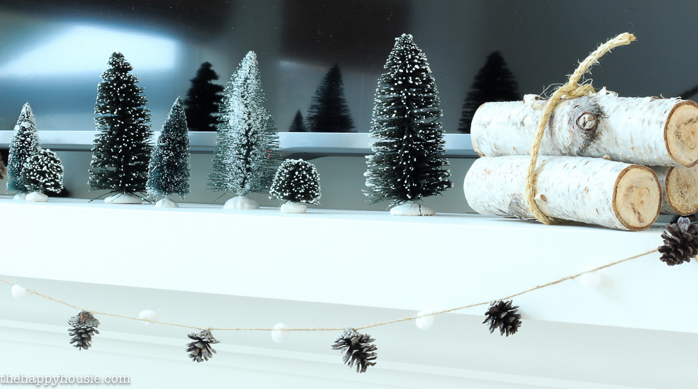 simple-rustic-natural-winter-mantel-decor-with-bottle-brush-trees-at-the-happy-housie-8-2