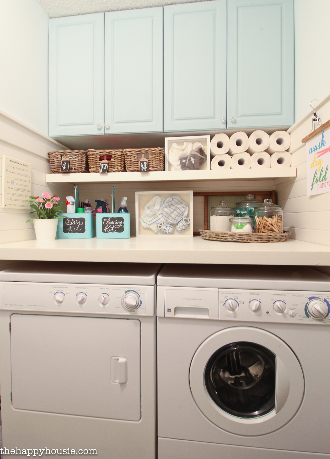 Laundry room decor with a washer and dryer.