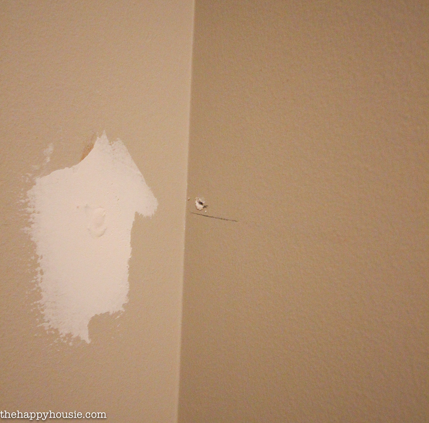 Patching holes in the wall.