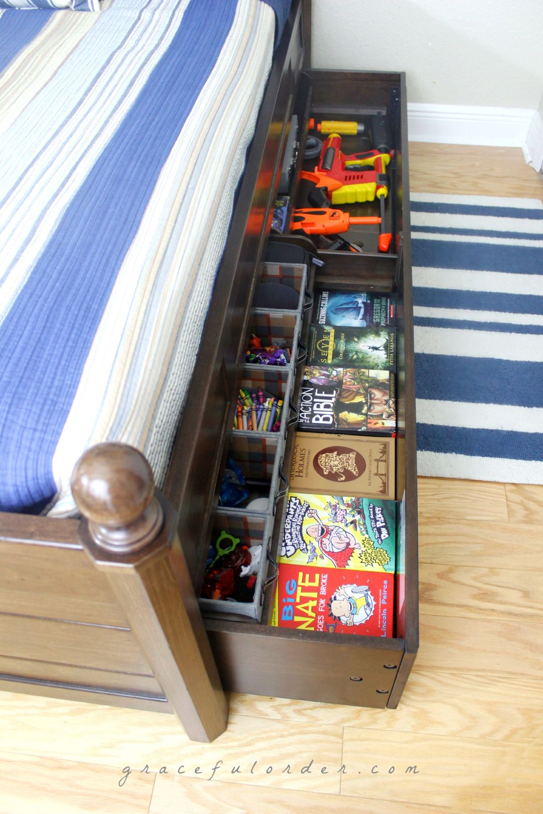 Drawers in the bed with items for storage.