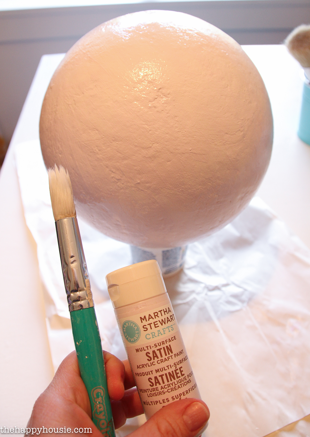 Painting the sphere a white colour.