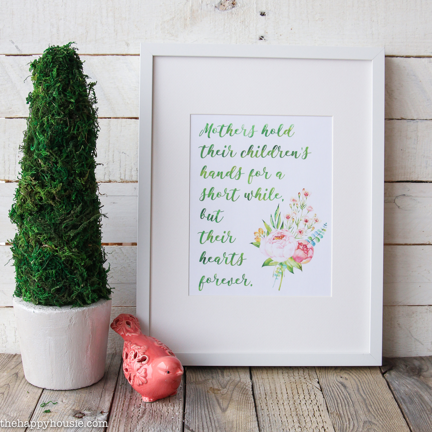 A Mother's Day quote framed in white.