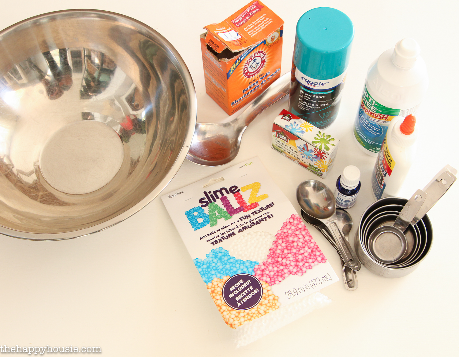 All the ingredients for the slime plus a large steel bowl.