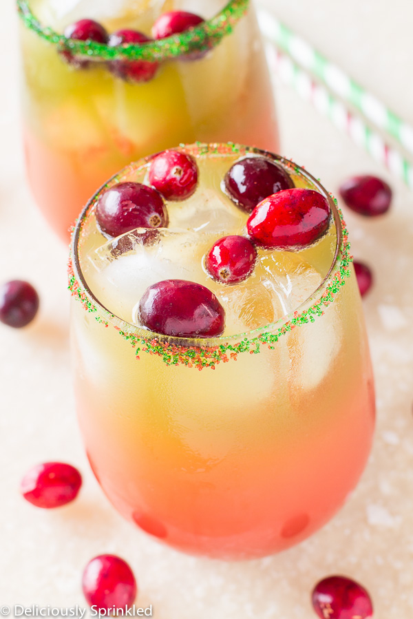 A holiday punch with cranberries inside it.