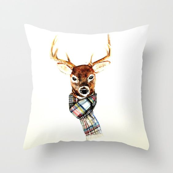 A deer graphic on a pillow.