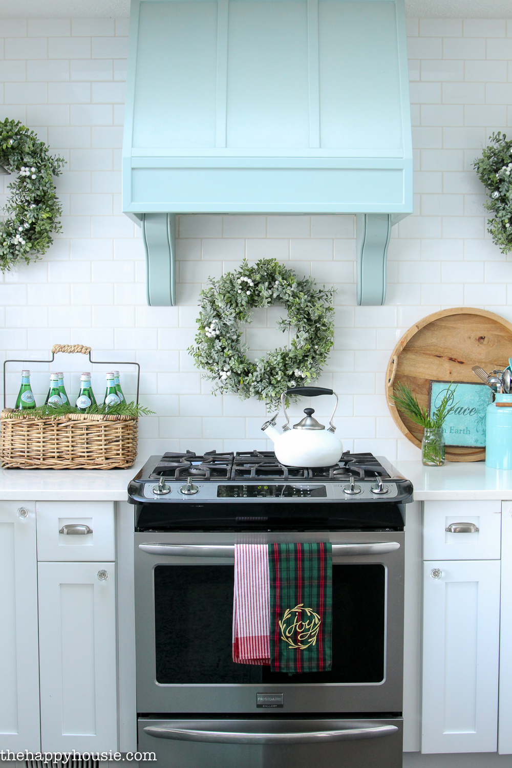 Pops of holiday greenery in the kitchen.