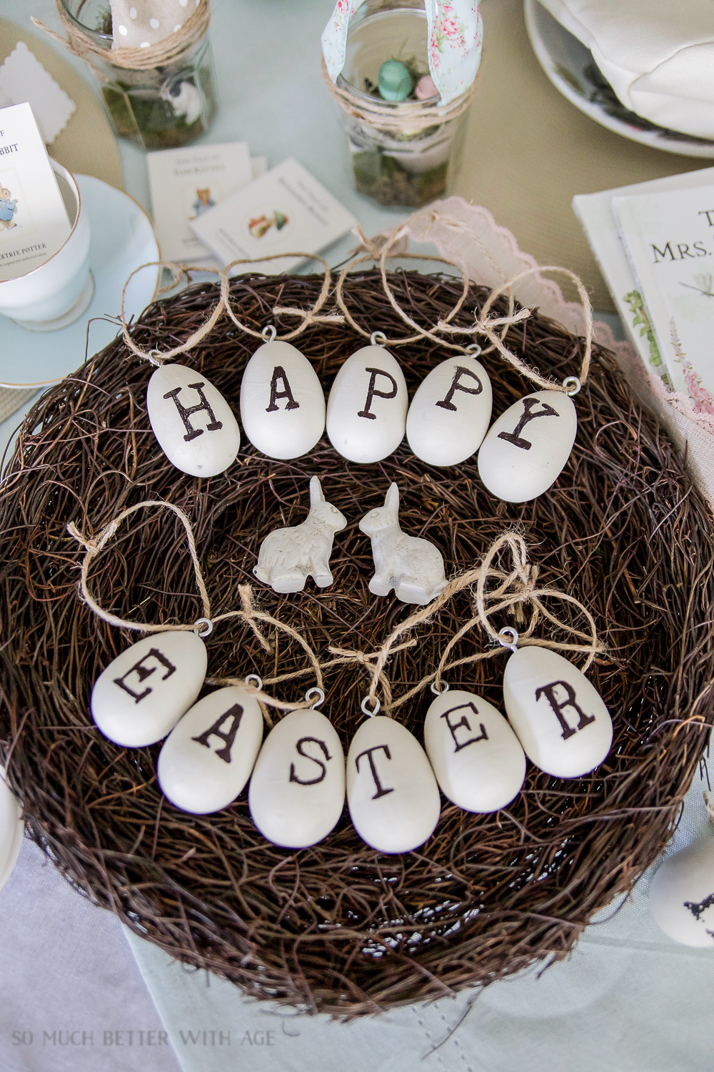 A nest filled with Eggs spelling out Happy Easter.