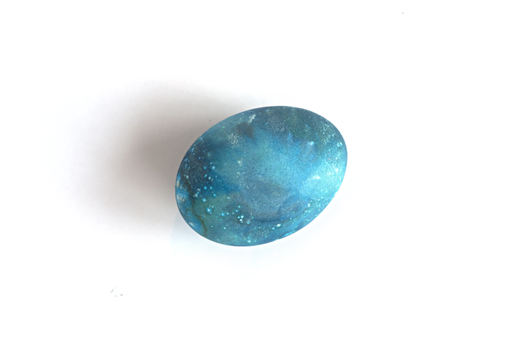 A single blue dyed Easter egg.