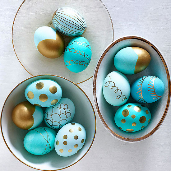 Bright blue and gold painted eggs.