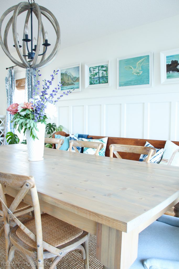 White panelling in a coastal dining room.