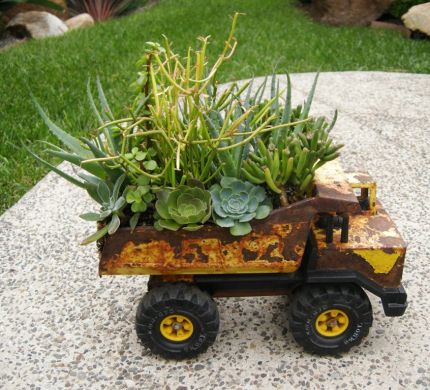An old toy truck turned into a planter.