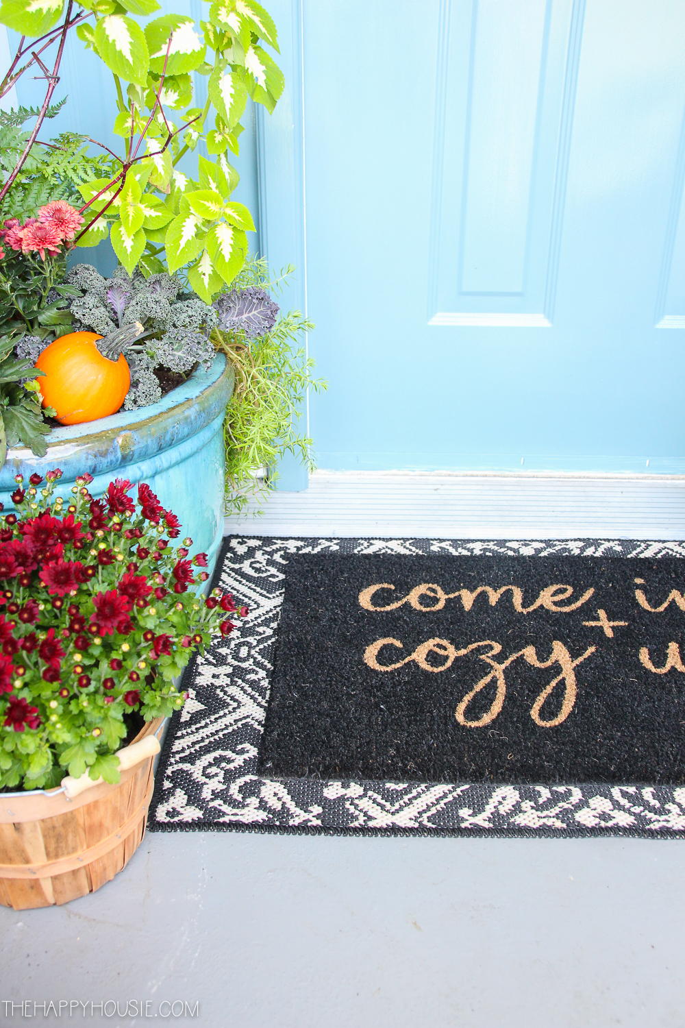 A rug by the front door that welcomes guests.