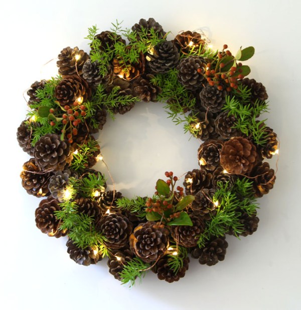 Pinecone wreath with fairy lights.