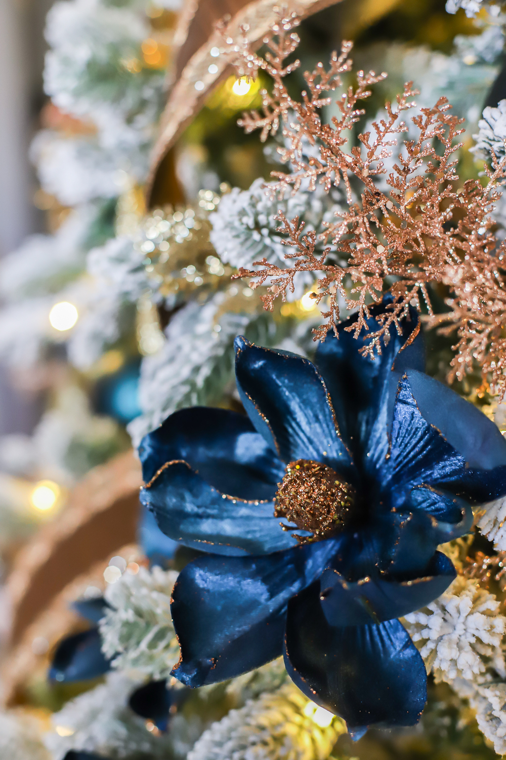 A dark blue faux holiday flower.