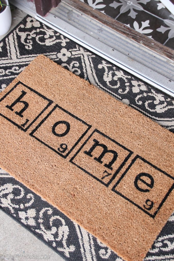 The mat that says home in black block letters on the front porch.