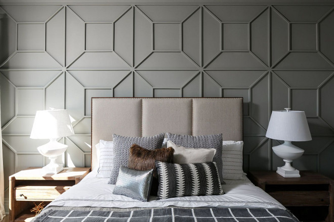 Soft ombre grey panelled walls in the bedroom.