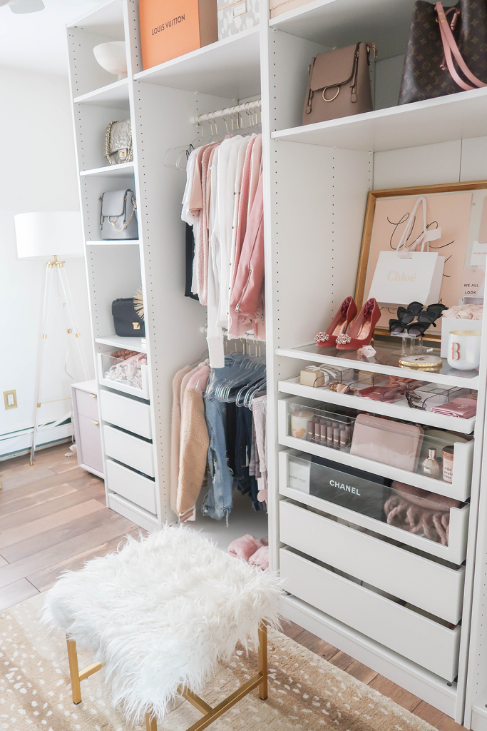 an Ikea PAX wardrobe system without doors used in an office-closet or "cl-office" space
