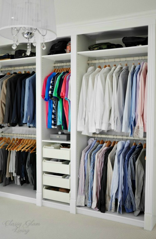 a walk-in closet that uses the Ikea PAX wardrobe system for organized clothing storage